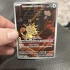 2025 Pokémon Full Art / Illustration Rare Holo Team Rocket’s Meowth (203/182) NM