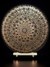 hand painted mandala with metallic colors