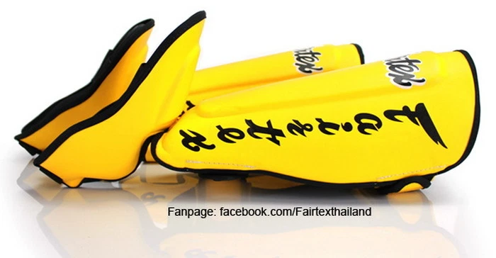 FAIRTEX SP7 ESPINILLERAS RETORCIDAS PROTECTORES PROTECTOR DE PIE AMARILLO MUAY THAI KICK BOXING Foto 2 de 4