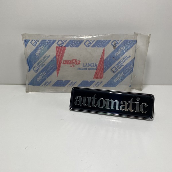 Original Lancia Dedra Automatic Sigla Modell Aufkleber 82486360 OE-image