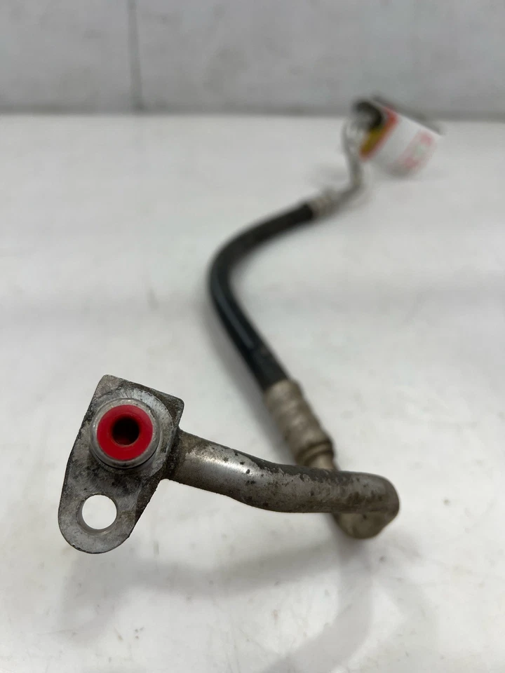 Manguera de descarga de refrigerante de aire acondicionado Nissan Armada Titan 2004-2015 OEM 92490ZT05A Foto 2 de 3