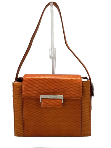 YVES SAINT LAURENT embossed leather shoulder bag in bright orange. Scratches on
