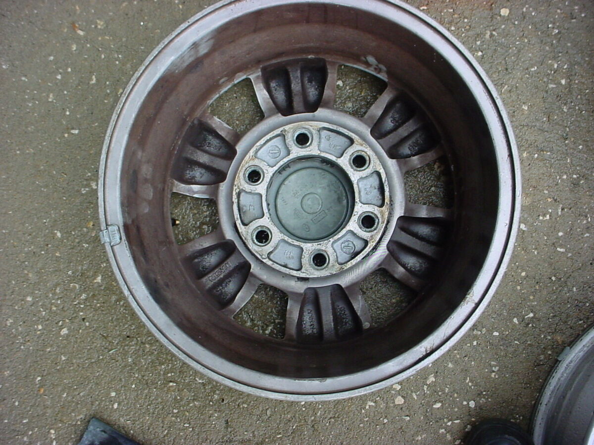 3 1999 NISSAN FRONTIER 14 INCH WHEELS AND CENTER CAPS LOW 3 1999 NISSAN FRONTIER 14 INCH WHEELS AND CENTER CAPS LOW