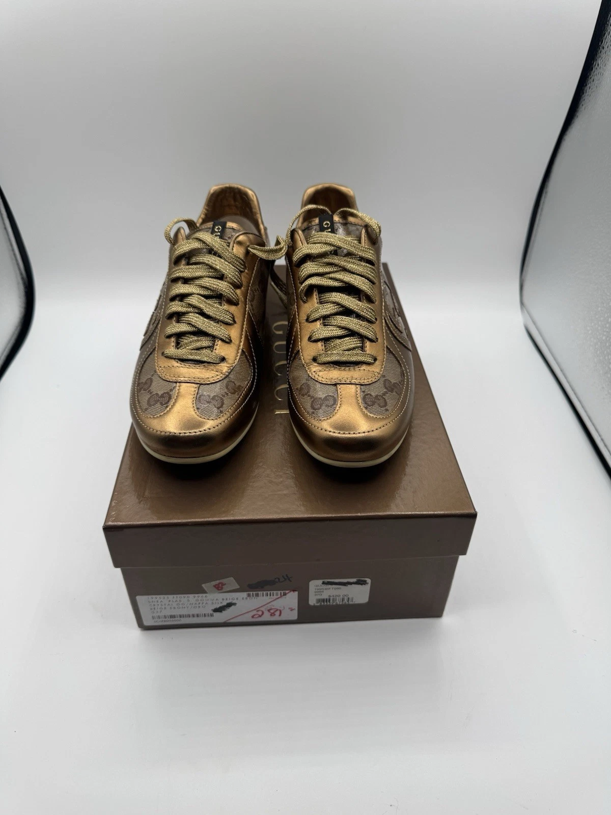 BASKETS D'ENTRAÎNEMENT GUCCI CUIR DORÉ ET LOGO TOILE FEMME TAILLE US 6,5 