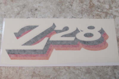 1977 Z/28 spoiler name. Red/orange/ black accent Z/28 name