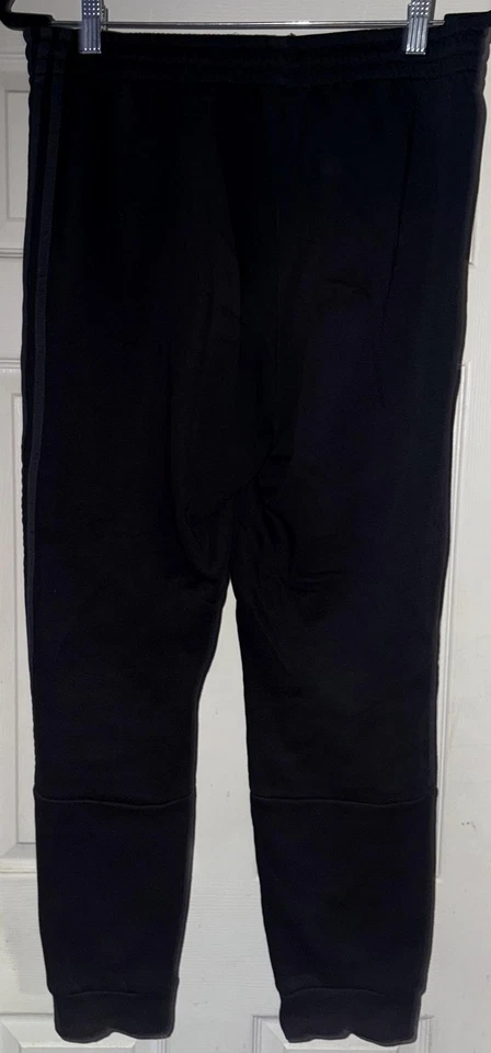 Pantalones de chándal Adidas para hombre medianos negros de 3 bandas de lana con puños cónicos Foto 2 de 3