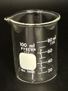Vintage Pyrex 100 ml laboratory beaker, model No. 1006, made in the USA.