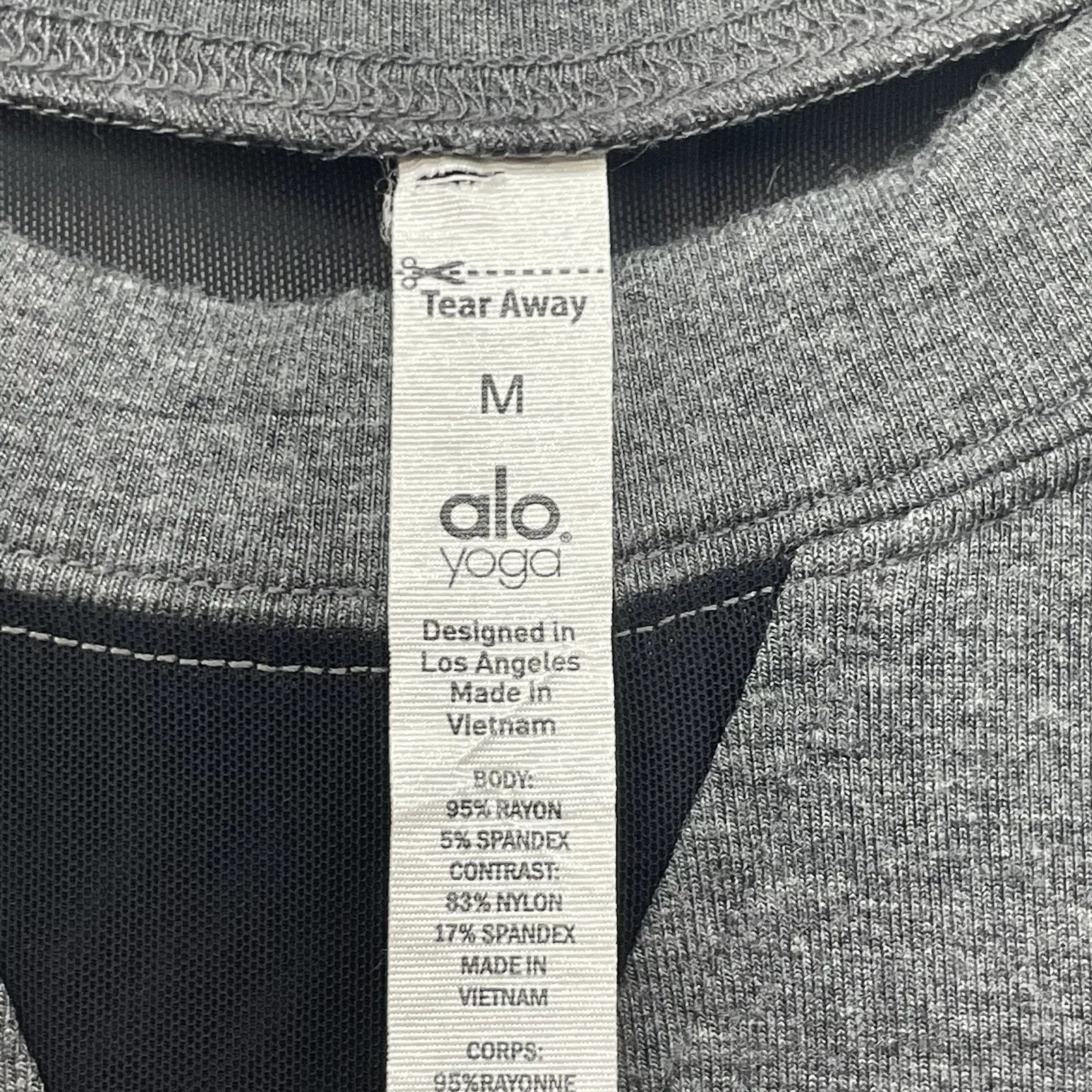 alo-yoga serene mesh cuff finger loop gym workout shirt
