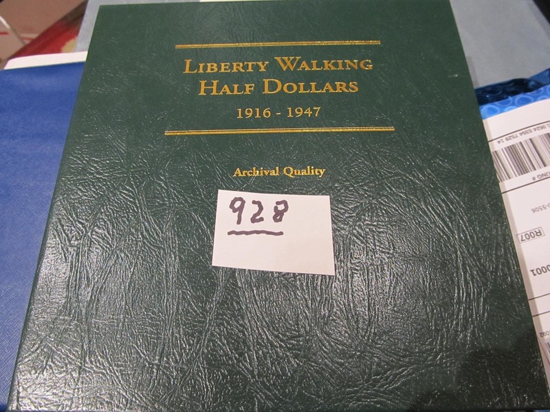 COINS: LITTLE COIN ALBUM WITH 16 WALKING LIBERTY HALF DOLLARS-UNCIRCULATED