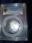 Canada 50C 1967 Silver PCGS PL65 Wolf Reverse Centennial Coin Gold Shield  — photo 1