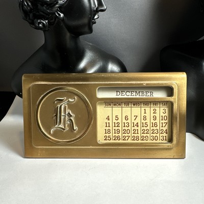 Heavy vintage brass perpetual calendar K for desk