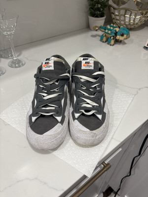Nike Blazer Low x sacai in a dark gray and white colorway