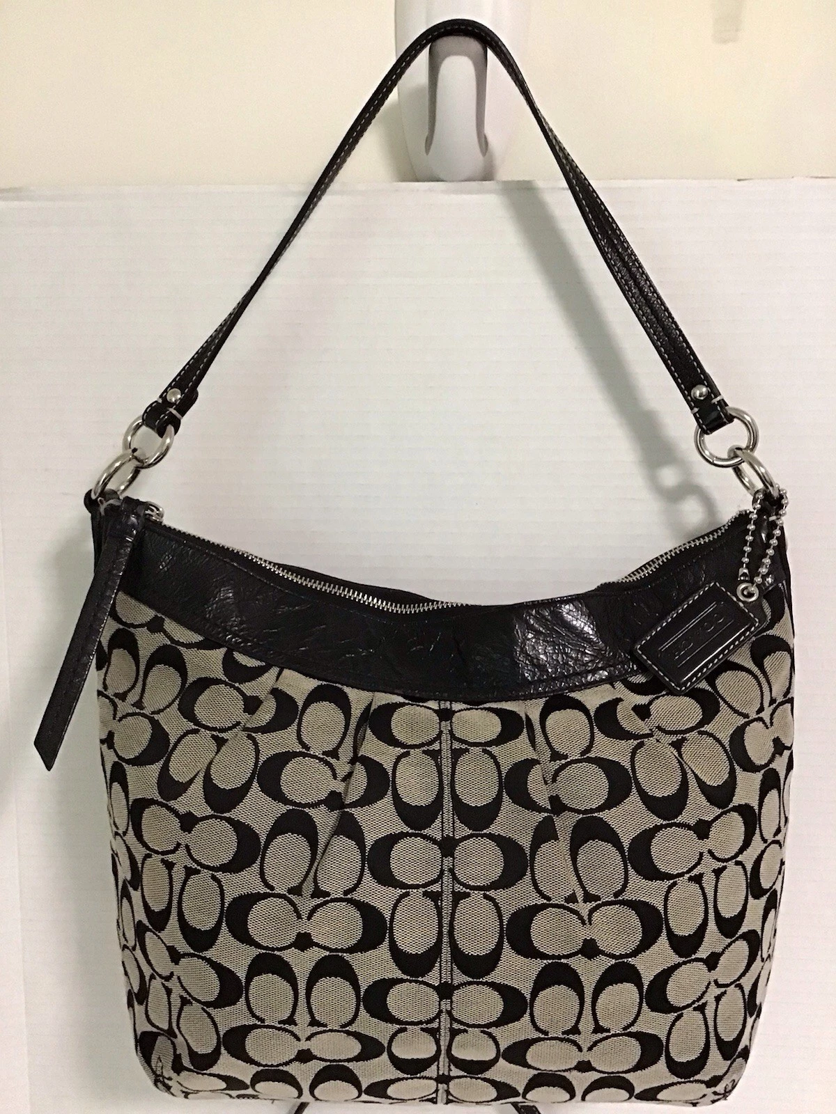 Borsa a tracolla Coach nera tela bordo pelle con polso omaggio usata in ottime condizioni