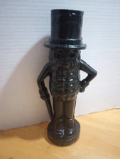 Mr. Peanut  Metal  door stopper, 8" Tall. It's  a Bank. 