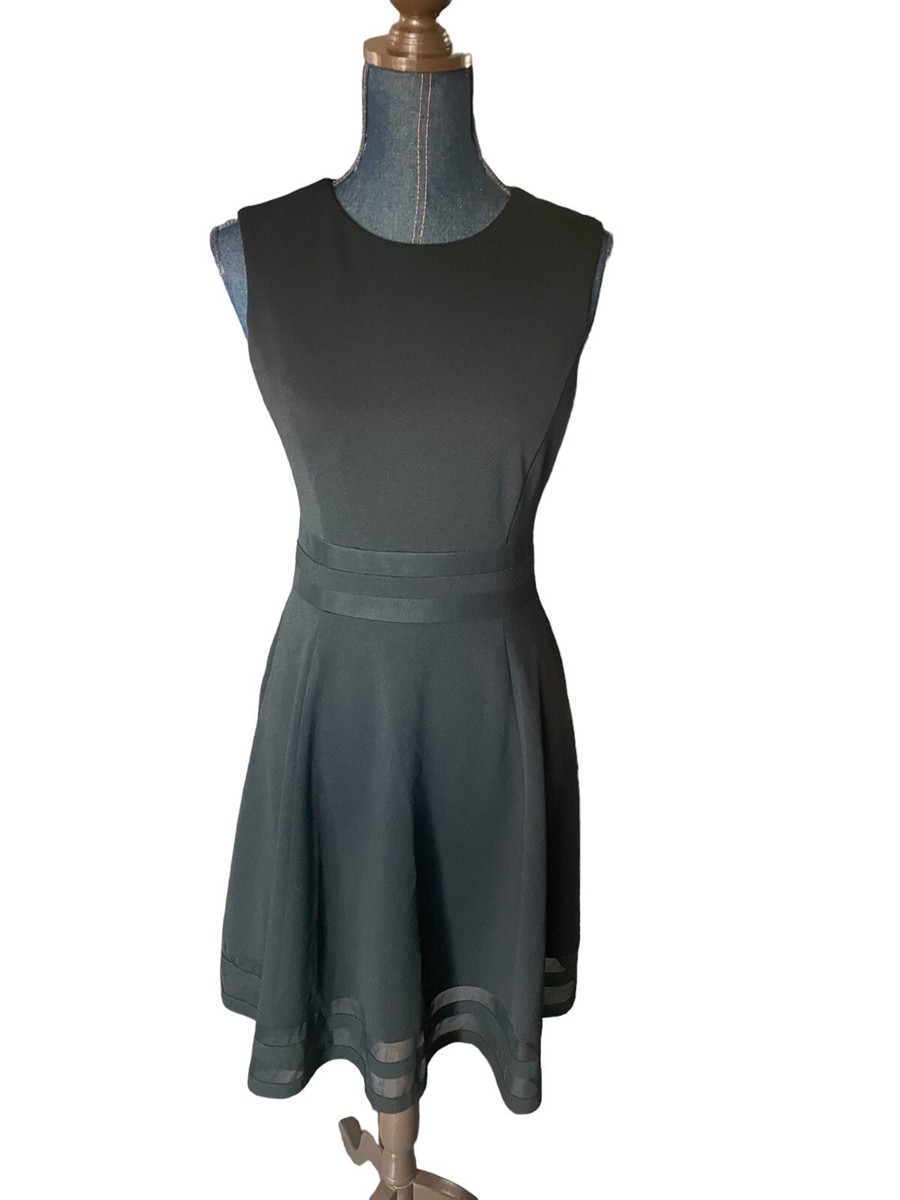 green emerald velvet dress Buy Calvin Klein Women's Sleeveless Round Neck Fit and Flare Dress with  Sheer Inserts, Black, 6 at Amazon.in main image 1