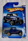 2009 Hot Wheels Walmart Exclusive Jeep Scrambler w/redline tires.