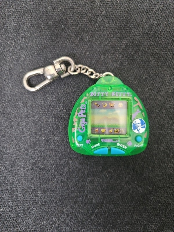 KFC Tiger Giga Pets Bitty Kitty Virtual Pet Toy Game Keychain 1997 Edition