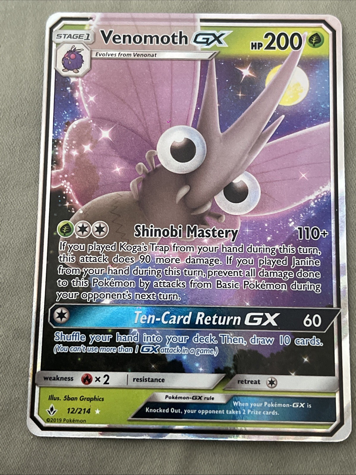 Venomoth GX 12/214 Sm-Unbroken Bonds Holo