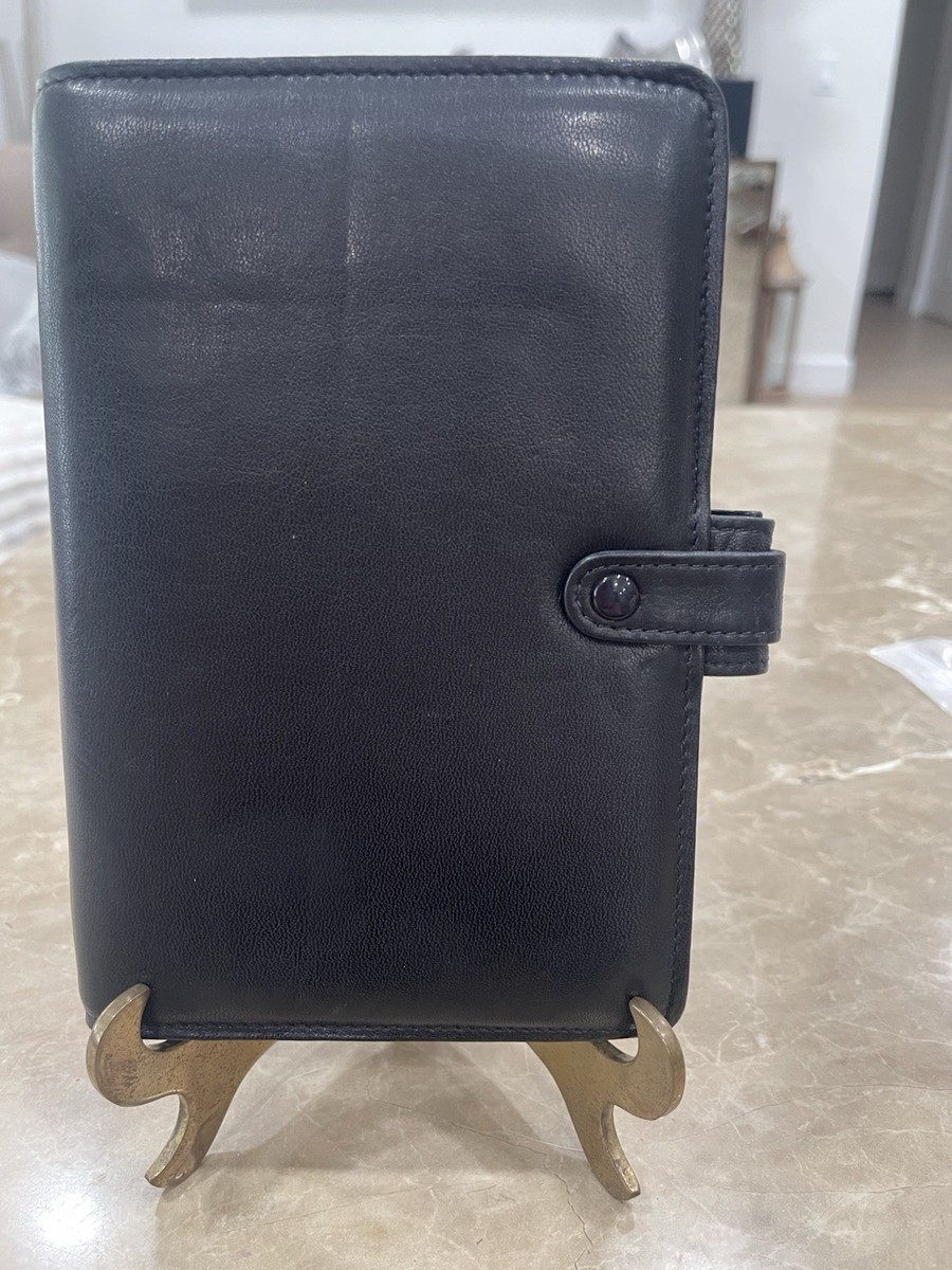 Filofax Black Leather Personal Portland organizer with a Filofax Black Leather Personal Portland organizer with a