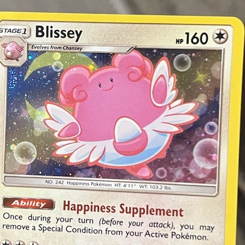 Pokemon Blissey 153/214 Cosmos Holo Partial Swirl Lost Thunder NM
