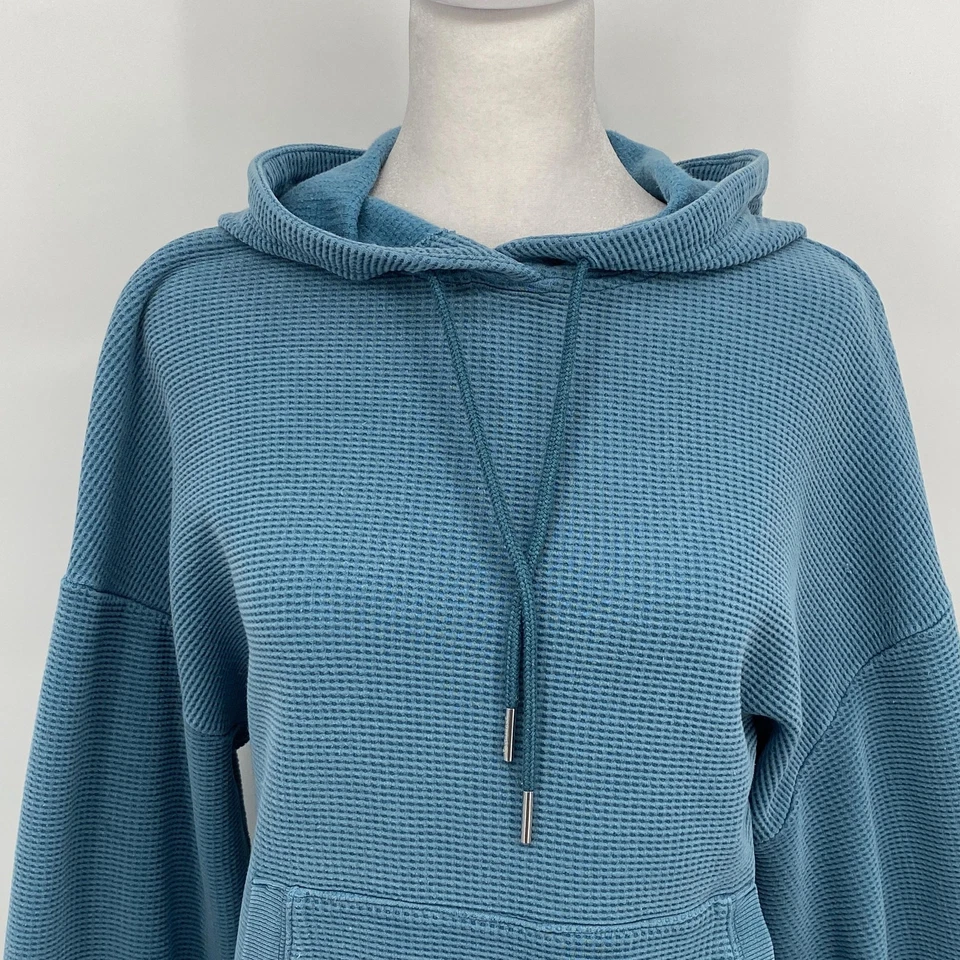 Sudadera con capucha tejida gofre Athleta para mujer mediana verde azulado pesado bolsillo canguro Foto 3 de 4