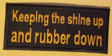 Keeping the shine up and the rubber down Embroidered Patch approx 1.75x4" orange