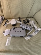 DJI Mini 2 SE Fly More Combo Drone with 3 Batteries, Carry Case