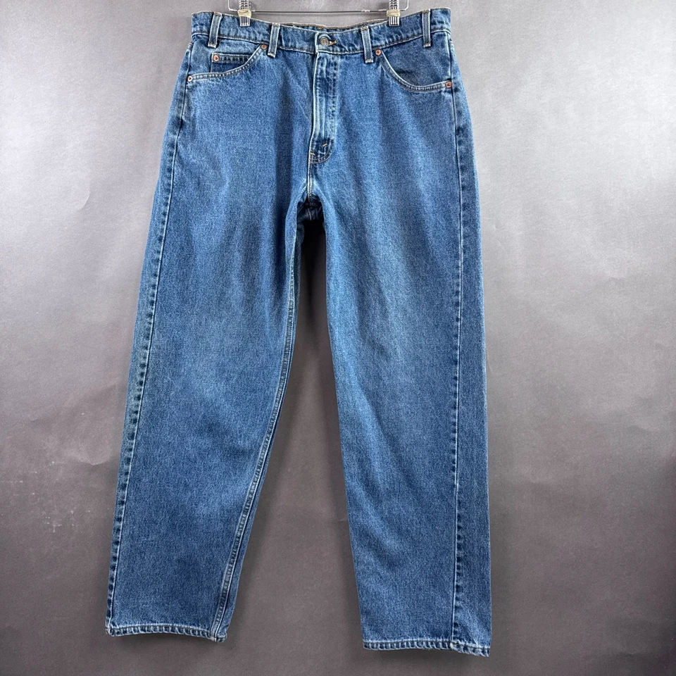 Pantalones de mezclilla vintage Levis para hombre 36x32 azul 565 pierna ancha lengüeta naranja años 90 hechos en EE. UU. Foto 2 de 4