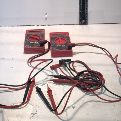 Lot of 2 - 7 Function Digital Multimeters Handheld Volt Ohm Meters w  Leads
