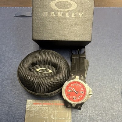 Oakley Quartz Analog Wristwatch Red Dial Black Rubber Strap 30m Box Manual