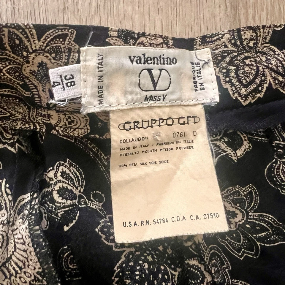 Falda acampanada midi de seda G2U VALENTINO 100 flores negras talla 4 IT 38 hecha en Italia Foto 2 de 4