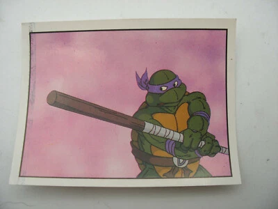 Stikers album PANINI 1990 immage TORTUES NINJA TURTLES Vignette n°34 - Photo 1/2