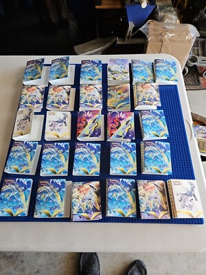 sought after pokemon cards Pokemon Card V Guard Energy Silver Tempest #215 Secret Rare Full Art Holo  PSA 8