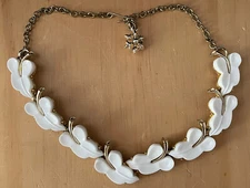 Molded Eight  White Plastic Leaves Gold Tone Necklace