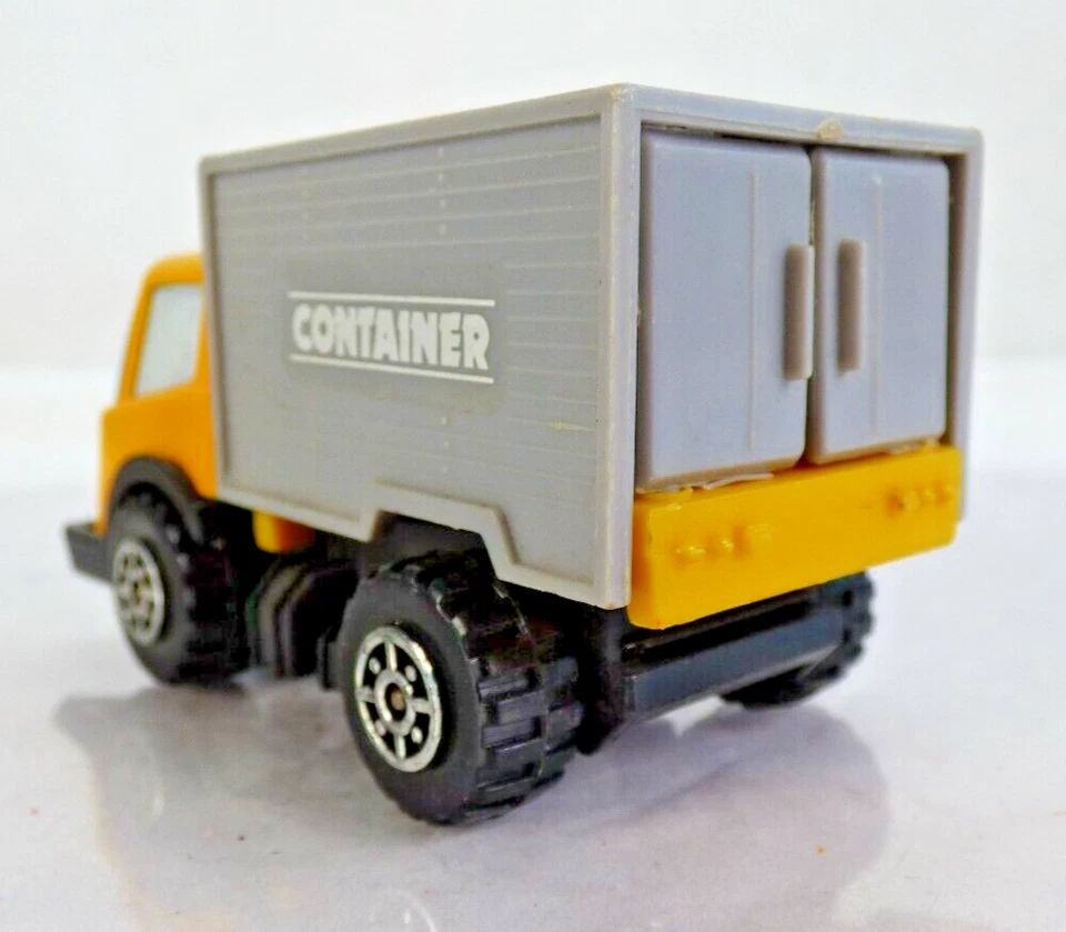 Camión de reparto contenedor de hojalata Tonka camión de colección amarillo coche de juguete Hong Kong Foto 3 de 4