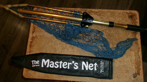 2000 series the masters adjustable fishing net with cover in good shape used