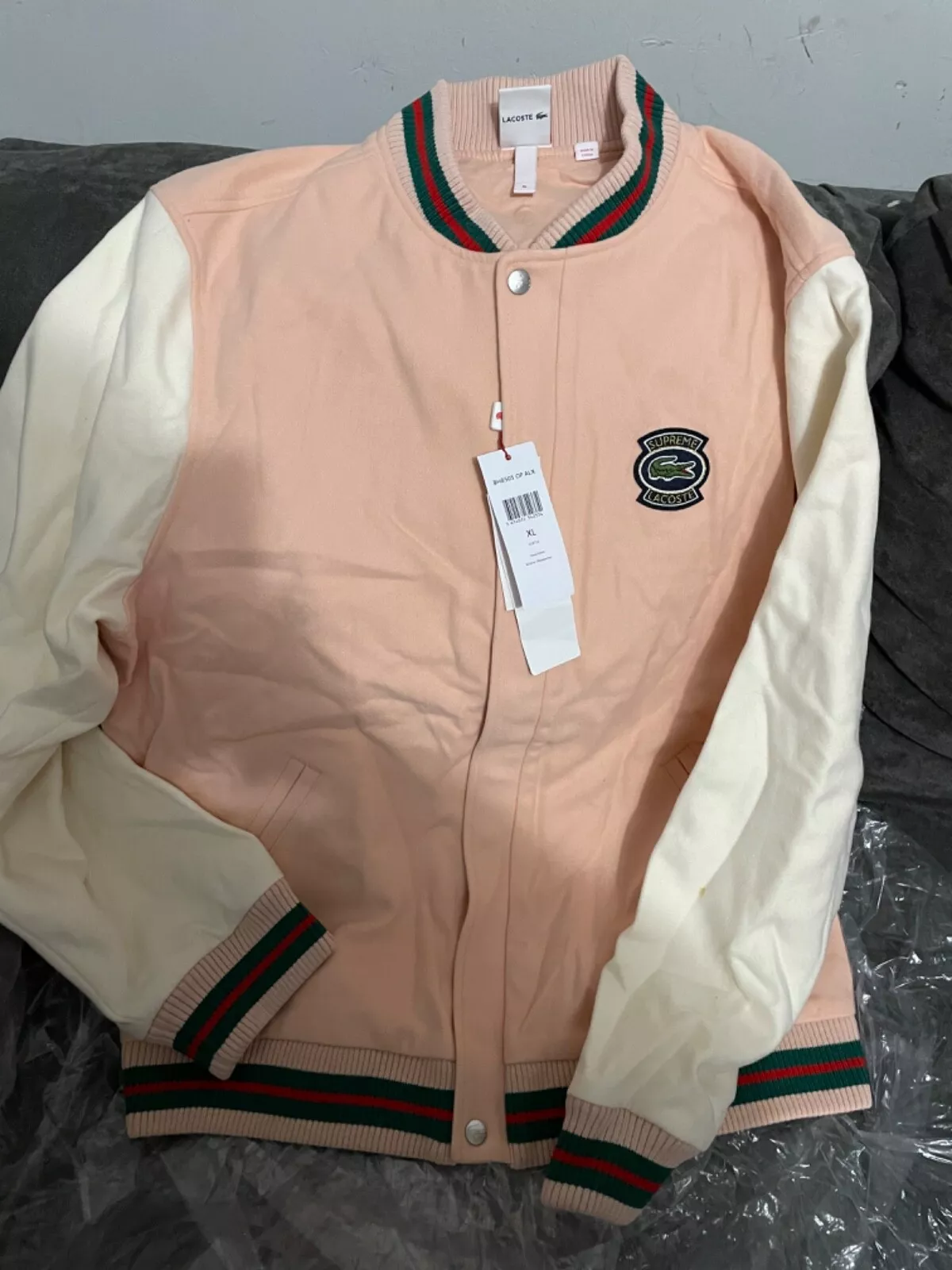 Veste universitaire en laine Supreme Lacoste taille grande pêche TAILLE XL