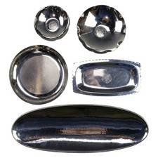 Five pieces of Keswick School of Industrial Arts Staybright tableware