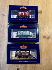 Rake of 3 Bachmann 8 Plank Wagons 37-125K, 37-155, 37-150K