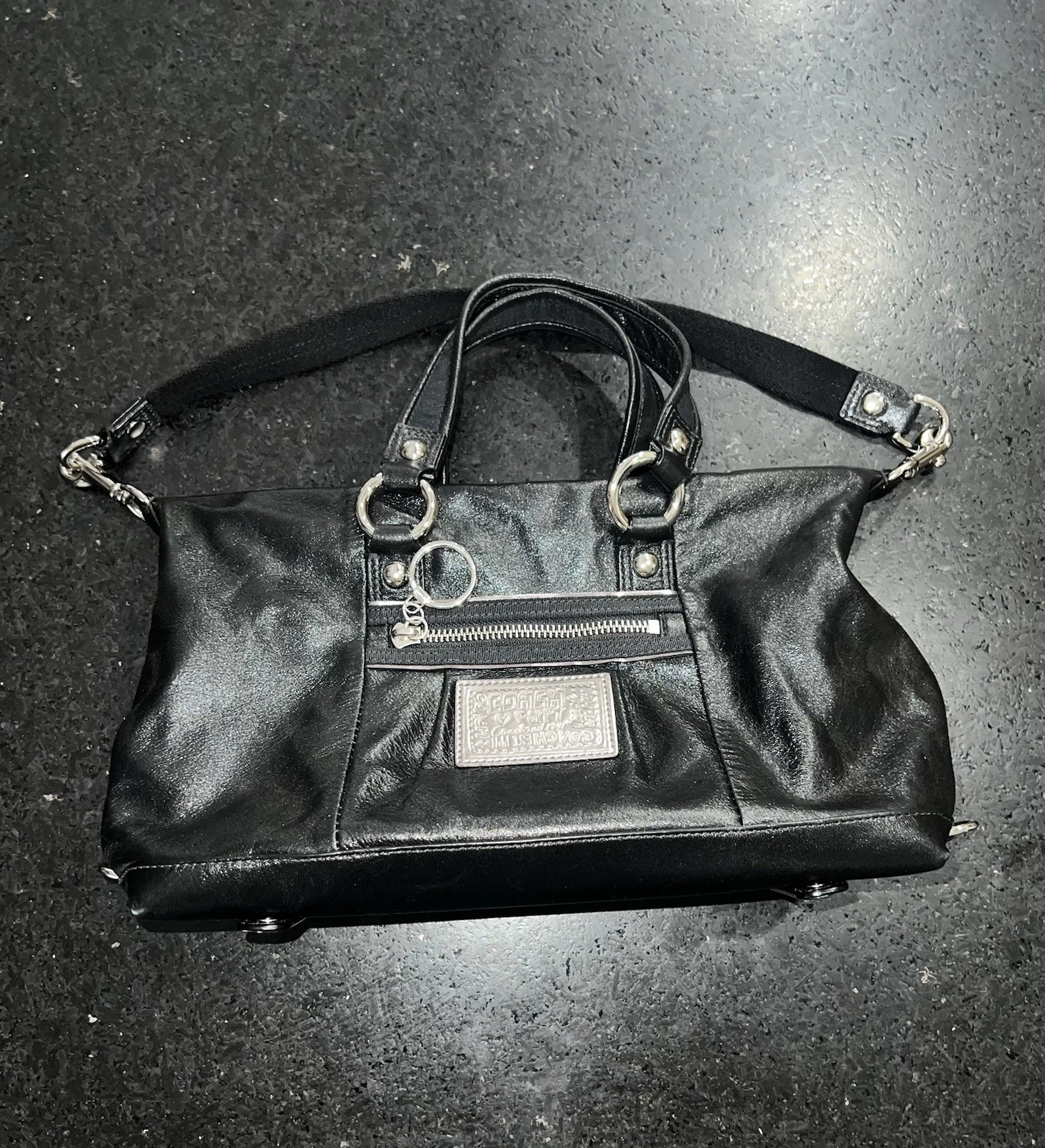 NUOVA BORSA COACH POPPY NERA PELLE SCINTILLANTE VIOLA INTERNO PORTACHIAVI