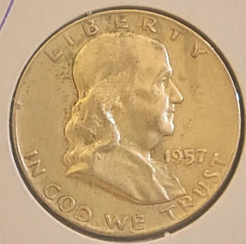 1957 D Franklin Half Dollar 90% Silver Looks like it has spent years in a folder