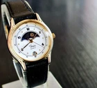 VINTAGE TIMEX DATE ELEGANT MOON PHASE QUARTZ WOMEN'S GOLDEN BLACK LEATHER WATCH