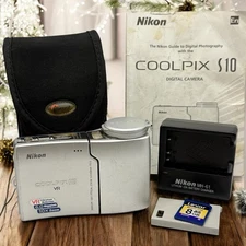 Nikon Coolpix S10 VR Digital Camera Silver Nikon Charger, SD Card, Battery, Case
