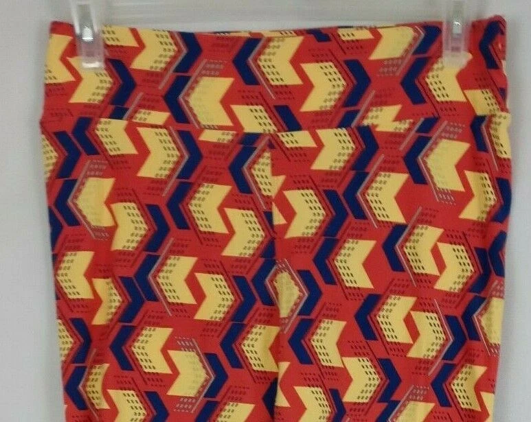 Nuevo LuLaRoe Leggings Altos y Curvilíneos Naranja con Diseño de Flechas Anchas Amarillas y Azules Foto 4 de 4