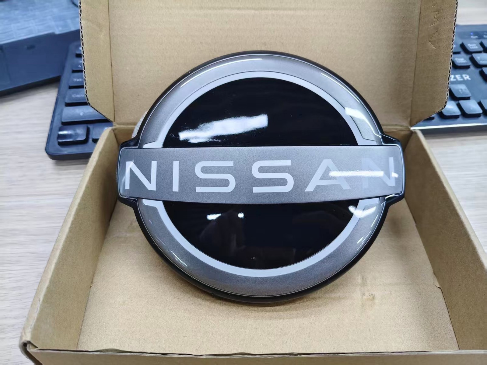 Fit For Nissan Rogue Front Grille Emblem 62890-6RM0A Radar 2021-2024 Badge