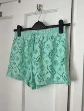 South Beach “cover up” shorts size 8. New without tags Turquoise Crochet Style