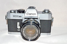 Canon EX AUTO QL with Canon EX 1:1.8 50 mm Lens " NEW SEALS, TESTED" C-18