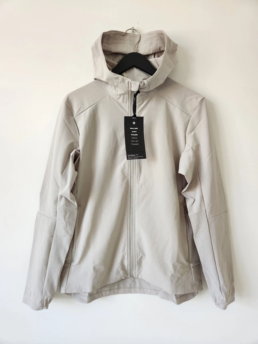 NWT LULULEMON RWLI Beige Warp Light Packable Hooded Jacket Men s
