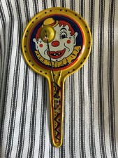 Vintage Kirchhof Clown Tin Noise Maker Metal Toy Paddle Clacker