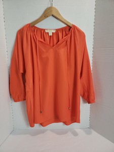orange peasant blouse